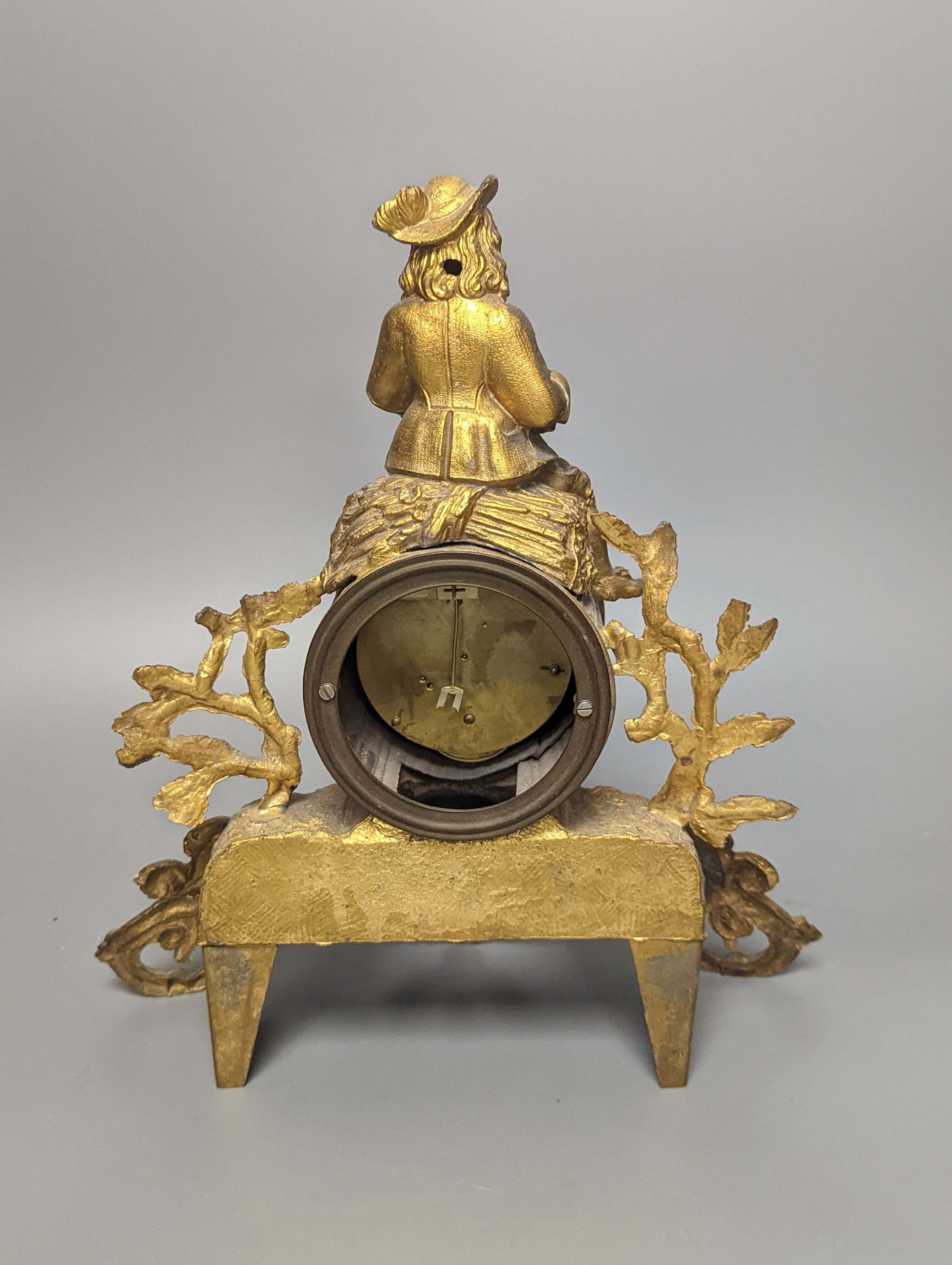 A 19th century French gilt spelter mantel timepiece, with pendulum, height 29cm